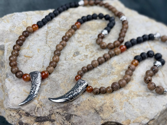 Zahn der alten Feuerwächter – Paarschmuck aus Holz, Lavastein & orangem Drachenstein